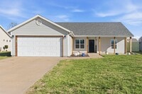 Building Photo - 3 Bedroom | 2 Bathroom | 2 Car Garage | Nixa Schools| Fireplace | Fenced yard | Solar Panels!