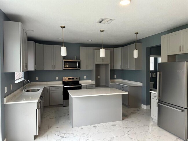 Building Photo - 545 1st Cape Coral Dr