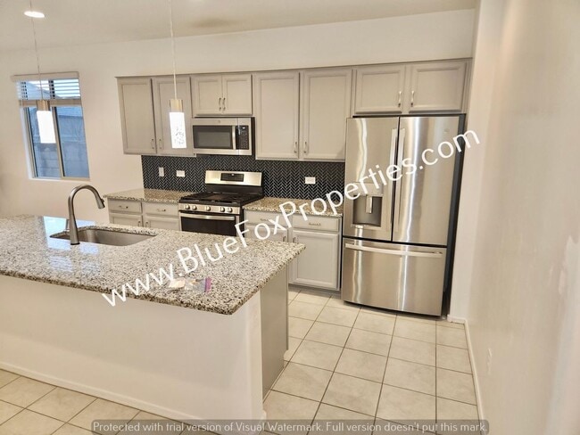 Building Photo - 10897 W Sarabella Dr