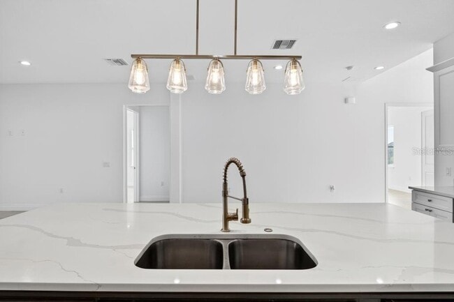 Building Photo - 200 Snowy Orchid Way