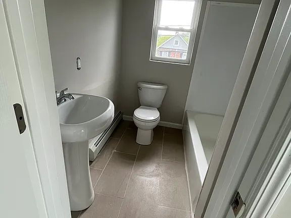 Building Photo - Move in to this singe family fully renovated home featuring 3 bedrooms 2 full baths located direc...