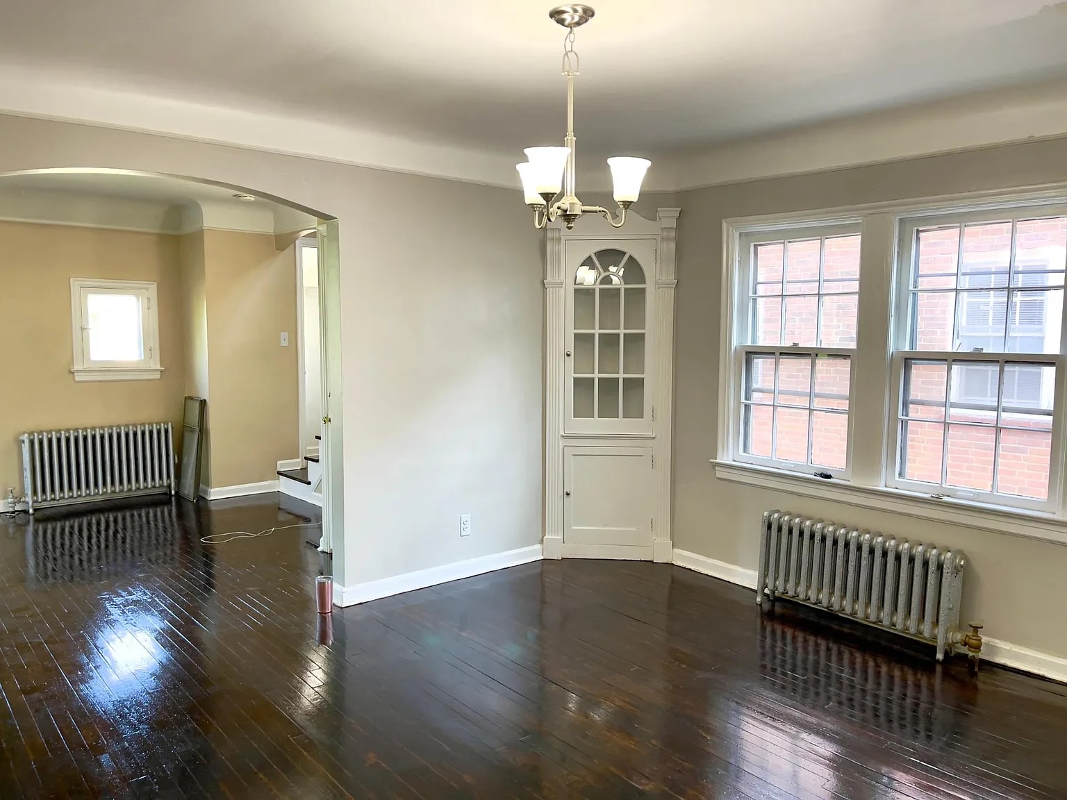 Bright kitchen with white cabinetry, dishwasher, and practical counter space. - 3682 Glencairn Road
