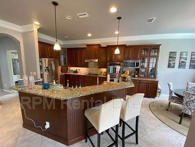 Building Photo - 4-Bedroom W/Den Lakefront Pool Home with Spa in Gated Promenade East at The Forum