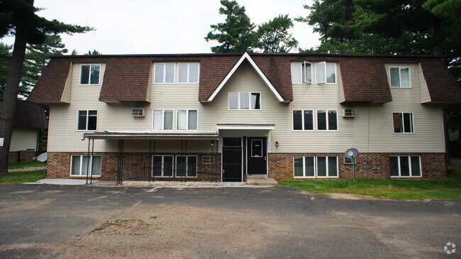 Building Photo - Woodland Chalet Apartments