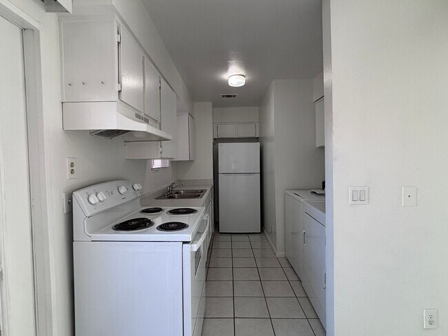 Building Photo - Charming Two-Story Townhouse with Fresh Updates & Prime Location
