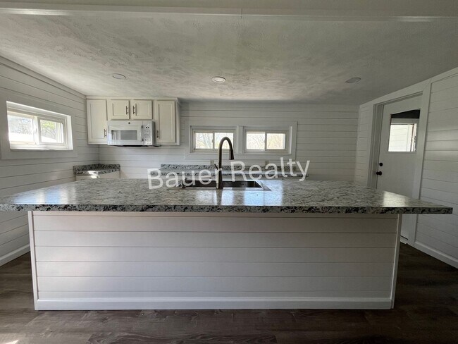 Building Photo - Renovated Three Bedroom Home