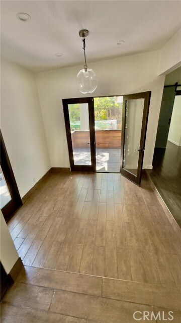Building Photo - 1216 N Beverly Glen Blvd