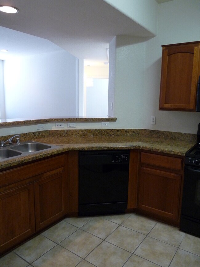 Building Photo - GATED 2 BEDROOM, 2 BATH CONDO IN JASMINE RANCH COMMUNITY