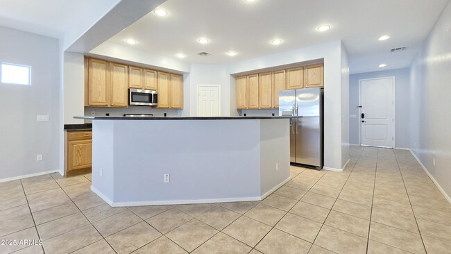 Building Photo - 16176 W Desert Mirage Dr