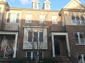Building Photo - Elegant 3 Story 3 Bedroom Formal Model Tow...