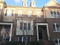 Building Photo - Elegant 3 Story 3 Bedroom Formal Model Tow...
