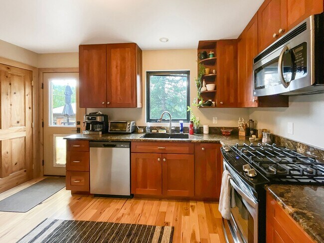 Building Photo - 2 Car Garage! Pets Negotiable! Two living ...