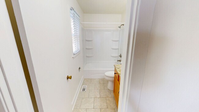 Building Photo - 3 Bedroom with 2 Living Rooms & finished b...