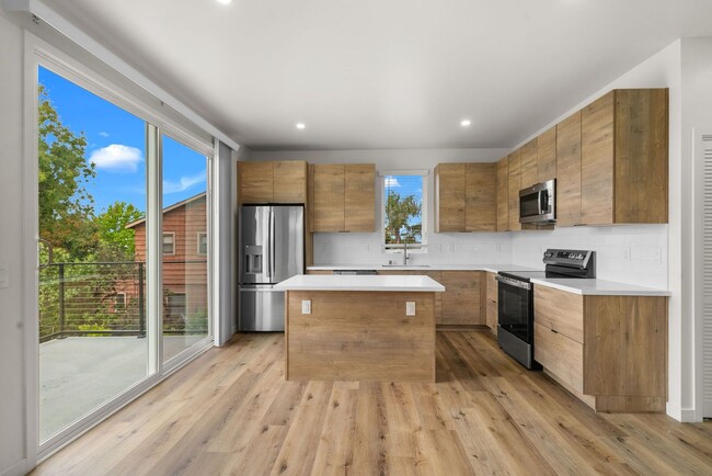 Building Photo - Introducing a stunning newly constructed t...