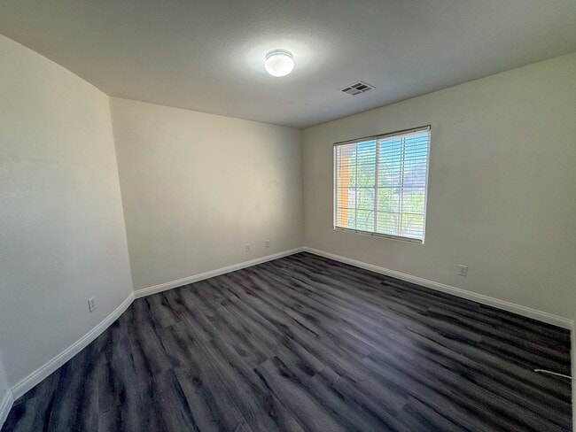 Building Photo - SPACIOUS HOME IN GATED COMMUNITY WITH POOL, RV PARKING & 4-CAR GARAGE!