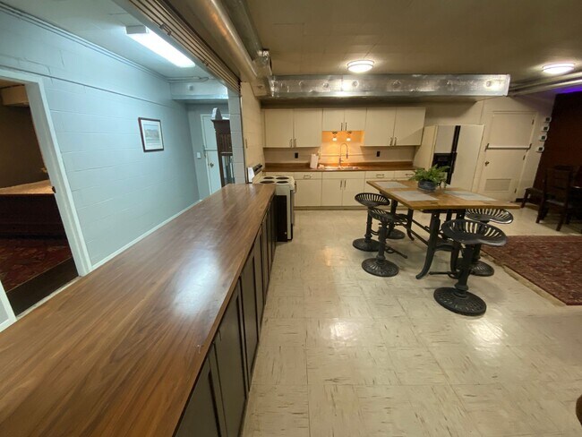 Building Photo - Furnished Loft-Style Apartment