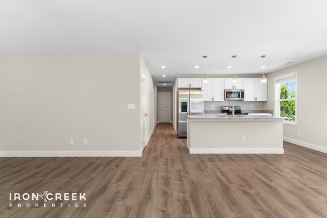 Building Photo - Bright and Modern: New Construction Three-...