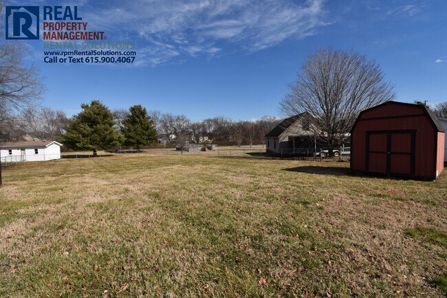 Building Photo - 3BR/2BA south Mboro 2-car garage, fenced backyard with brand new patio!
