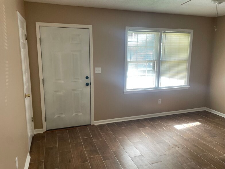 Den and coat closet - 105 Valencia Cir