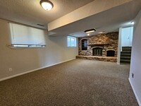 Building Photo - NE 4 bedroom 3 bath home with attached gar...