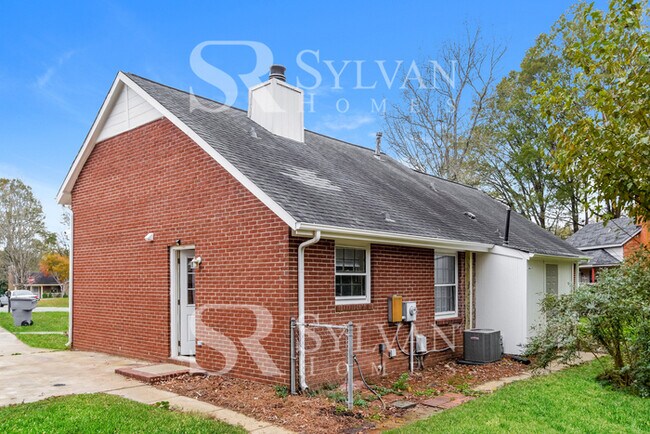 Building Photo - You'll love this charming brick home!