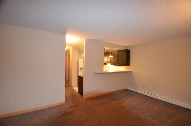 Building Photo - Updated Apartment!  Parking for 2 Cars! HEAT Included!