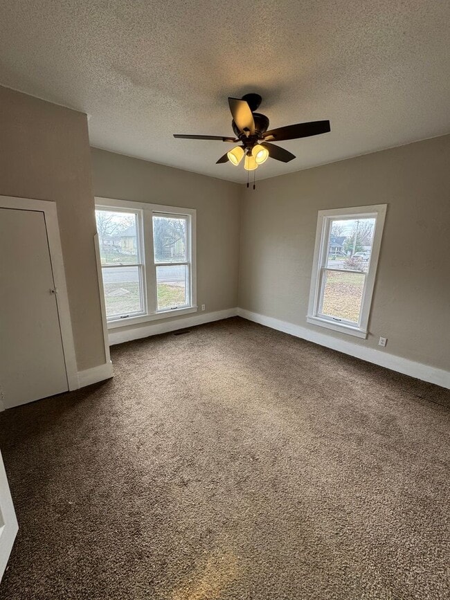 Building Photo - 4 bedroom/1 bath house w/storage building