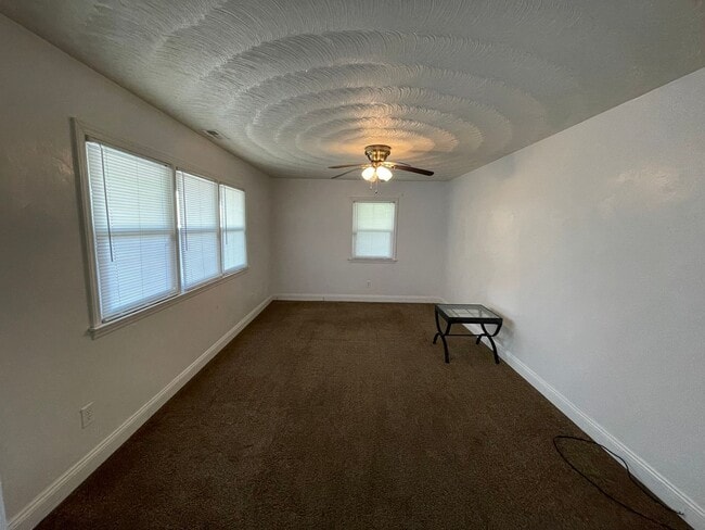 Building Photo - Spacious Home with Large Yard, Hot Tub, and More