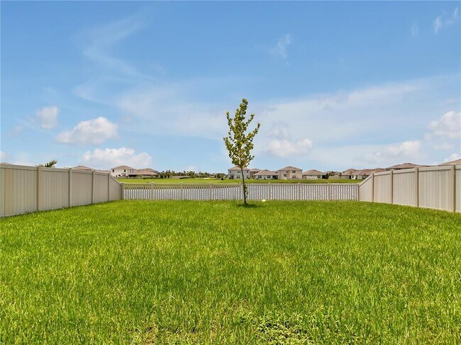 Building Photo - 5289 Fiddle Fig Ave