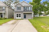 Building Photo - Spacious 4-Bedroom Home with First-Floor S...