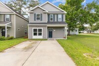 Building Photo - Spacious 4-Bedroom Home with First-Floor S...
