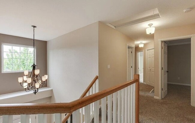 Building Photo - Spacious Four-Bedroom Home with Gourmet Kitchen, Multiple Living Areas, Loft, and Beautifully Lan...