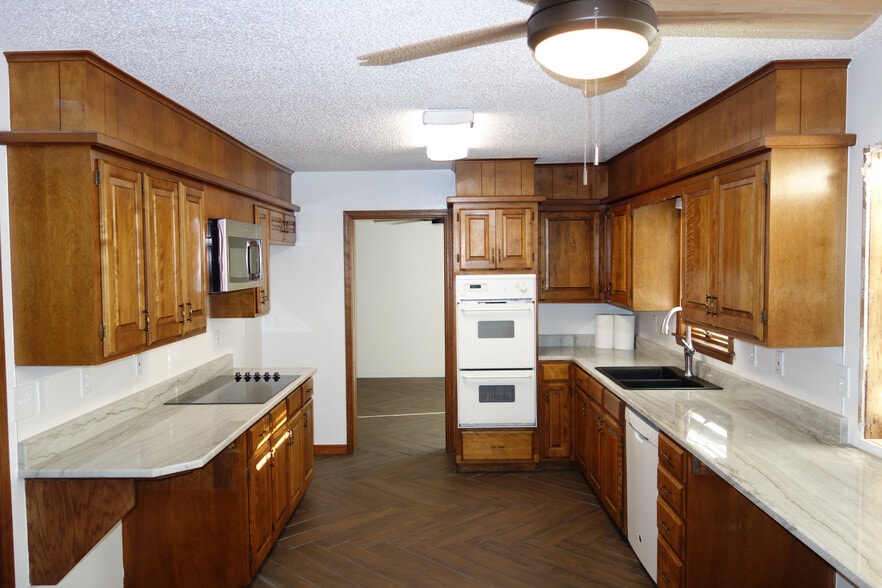 Kitchen, brand new countertops, double oven is also being replaced! - 7116 S Indianapolis Ave