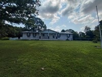 Building Photo - Fenced home close to post!