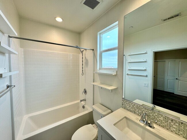 Building Photo - Spacious 4BD/3.5BA Townhome in Oceanside with Community Pool, 2-Car Garage & Covered Balcony