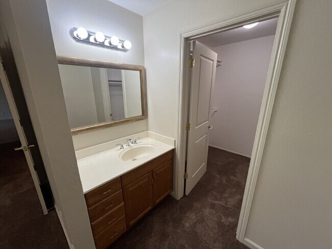 Building Photo - Downstairs 2 bedroom unit with parking and a patio
