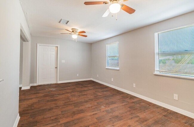 Building Photo - PRICE JUST REDUCED 3/2/1 1389 Sq. Ft. on a huge corner lot with granite & custom tile work!!