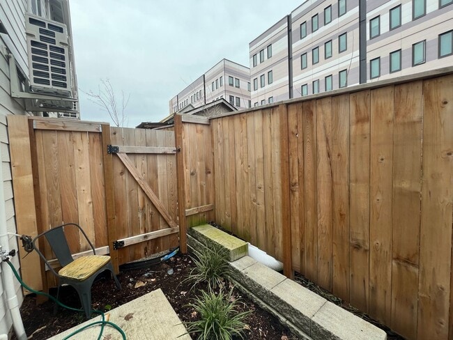 Building Photo - Modern 2-Bed, 1.5-Bath Condo with Custom Kitchen, Private Patio, and Prime Location