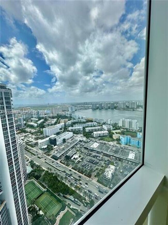 Building Photo - 18201 Collins Ave