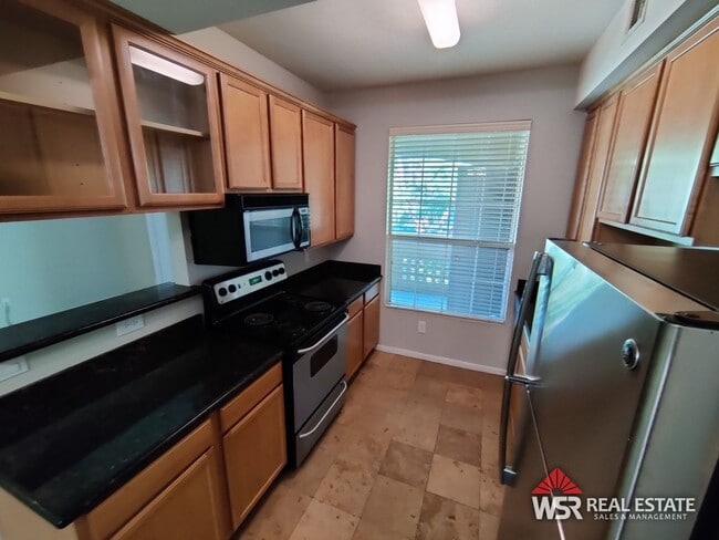 Primary Photo - 1 Bedroom Condo with Garage and Carport