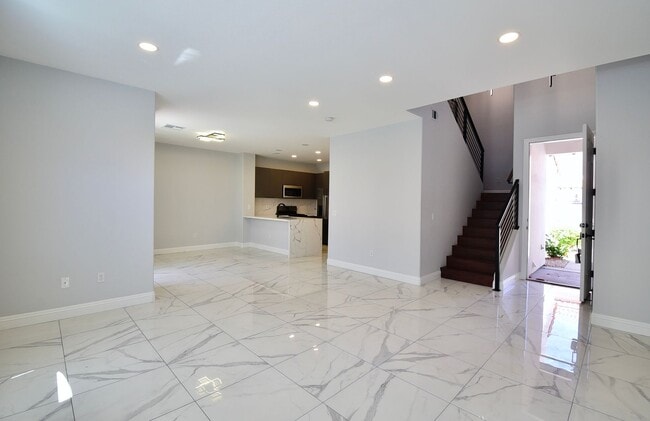 Primary Photo - Charming Mediterranean-Style Townhome in G...