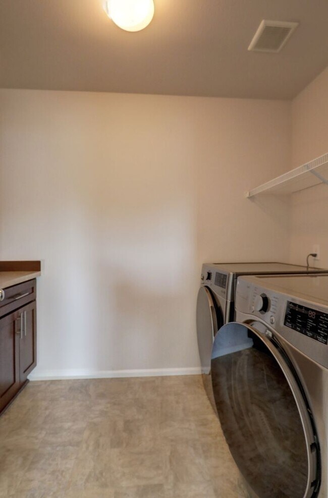 Building Photo - 4 Bedroom Home with Open Den, Living & Family Rooms – Space for Everyone
