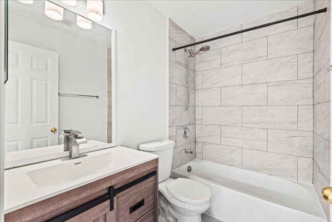 Building Photo - Modern Comfort Meets Convenience, Close to...