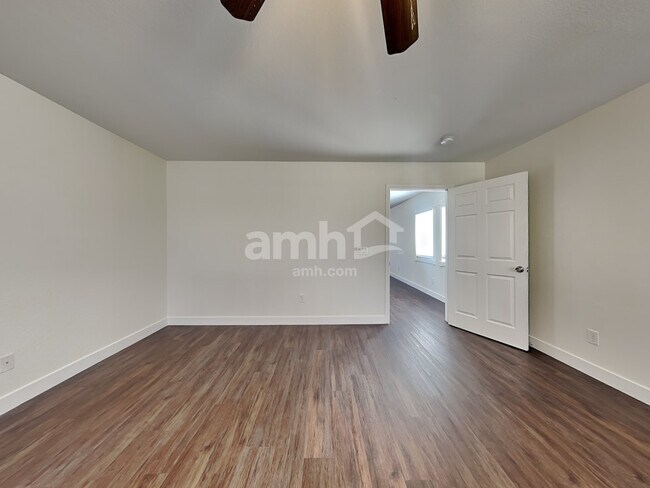 Building Photo - 10749 Artesia Wells St