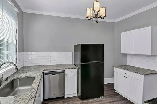 Building Photo - Beautifully renovated and repurposed house