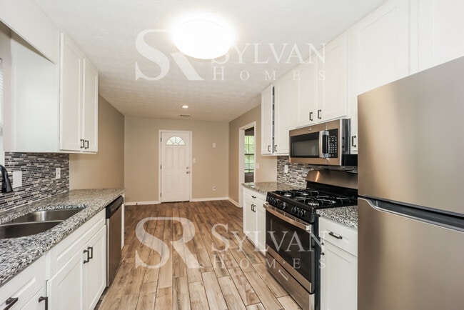 Building Photo - Lease today! No extra charge for contentme...