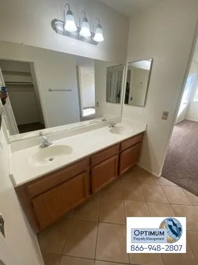 Building Photo - Spacious 4-Bedroom Home with 3-Car Garage & Downstairs Suite!