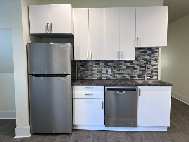 Building Photo - Updated 3 BR 2.5 bath house now available!