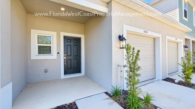 Building Photo - OUTSTANDING BRAND NEW TOWNHOME! SKYE RANCH...