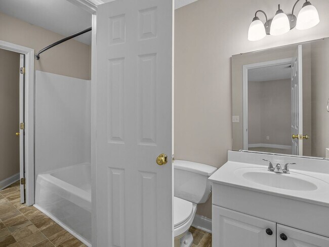 Building Photo - Freshly Renovated 2 BR, 2.5 BA Townhome Ce...